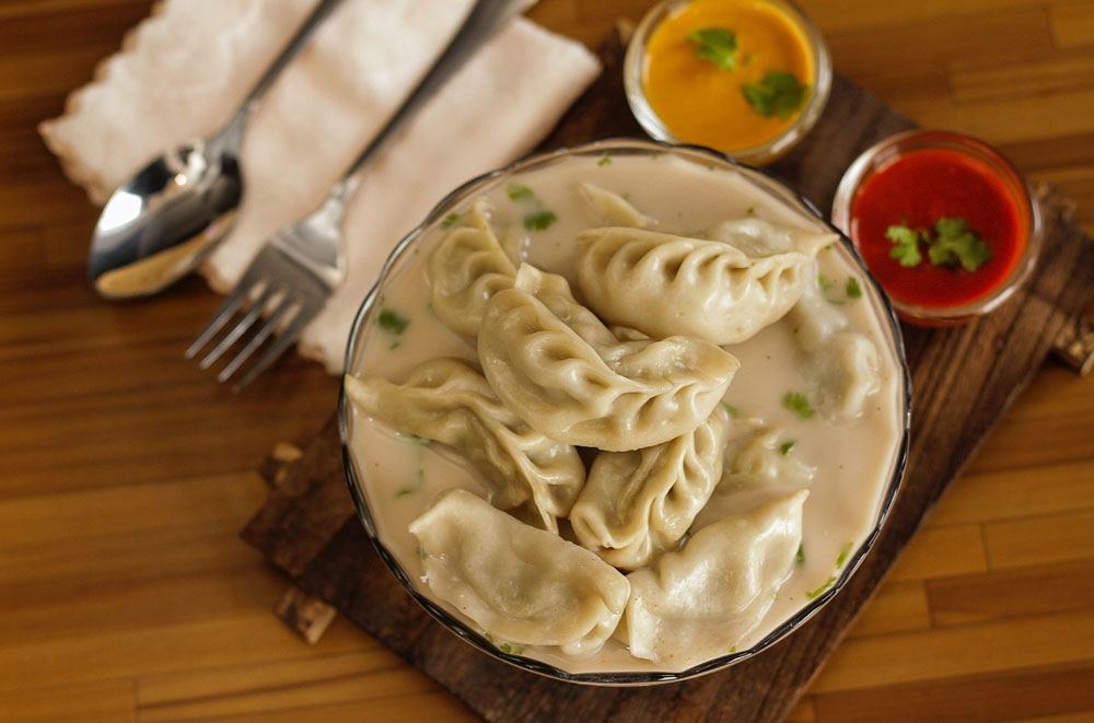 Momos are not a gluten free food option. 