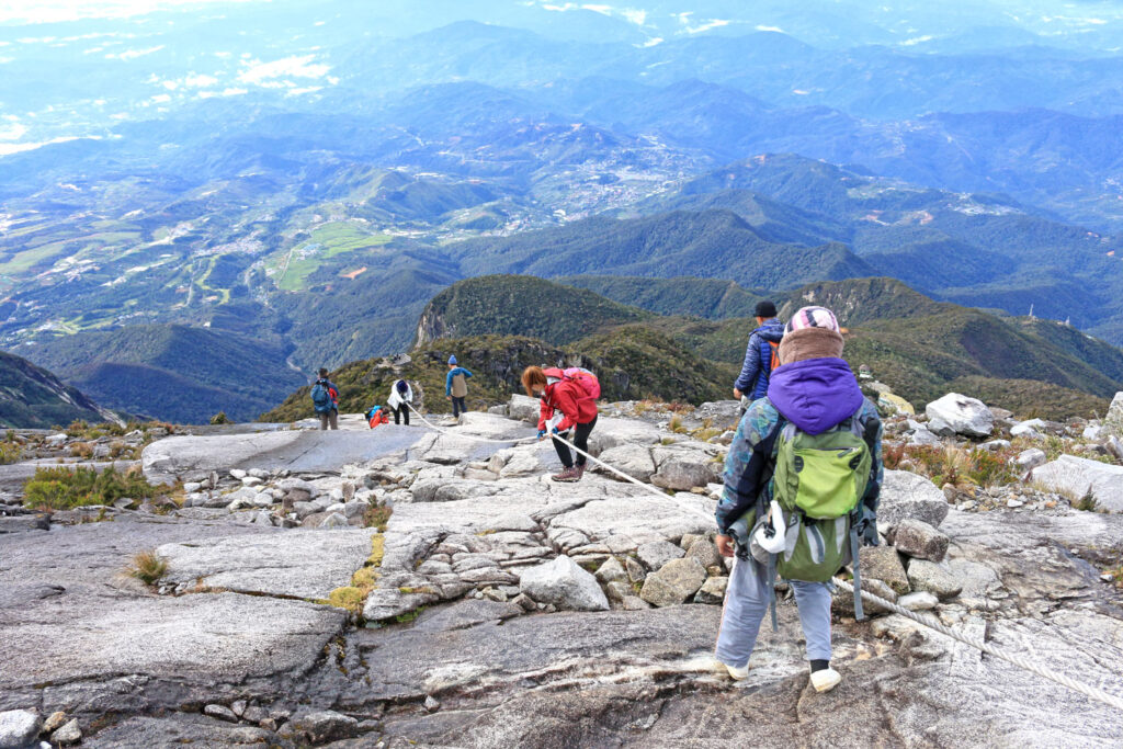 How hard is Mount Kinabalu to climb? You need the assistance of ropes near the summit.