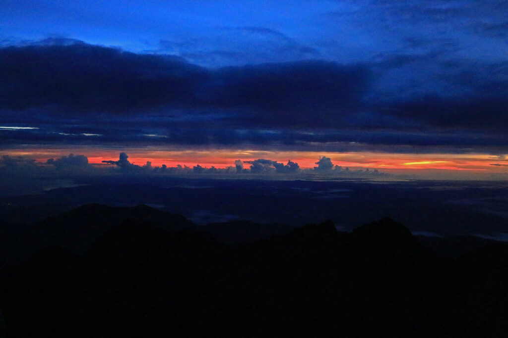 How hard is Mount Kinabalu to climb? The view from the summit makes the hard climb worthwhile. 